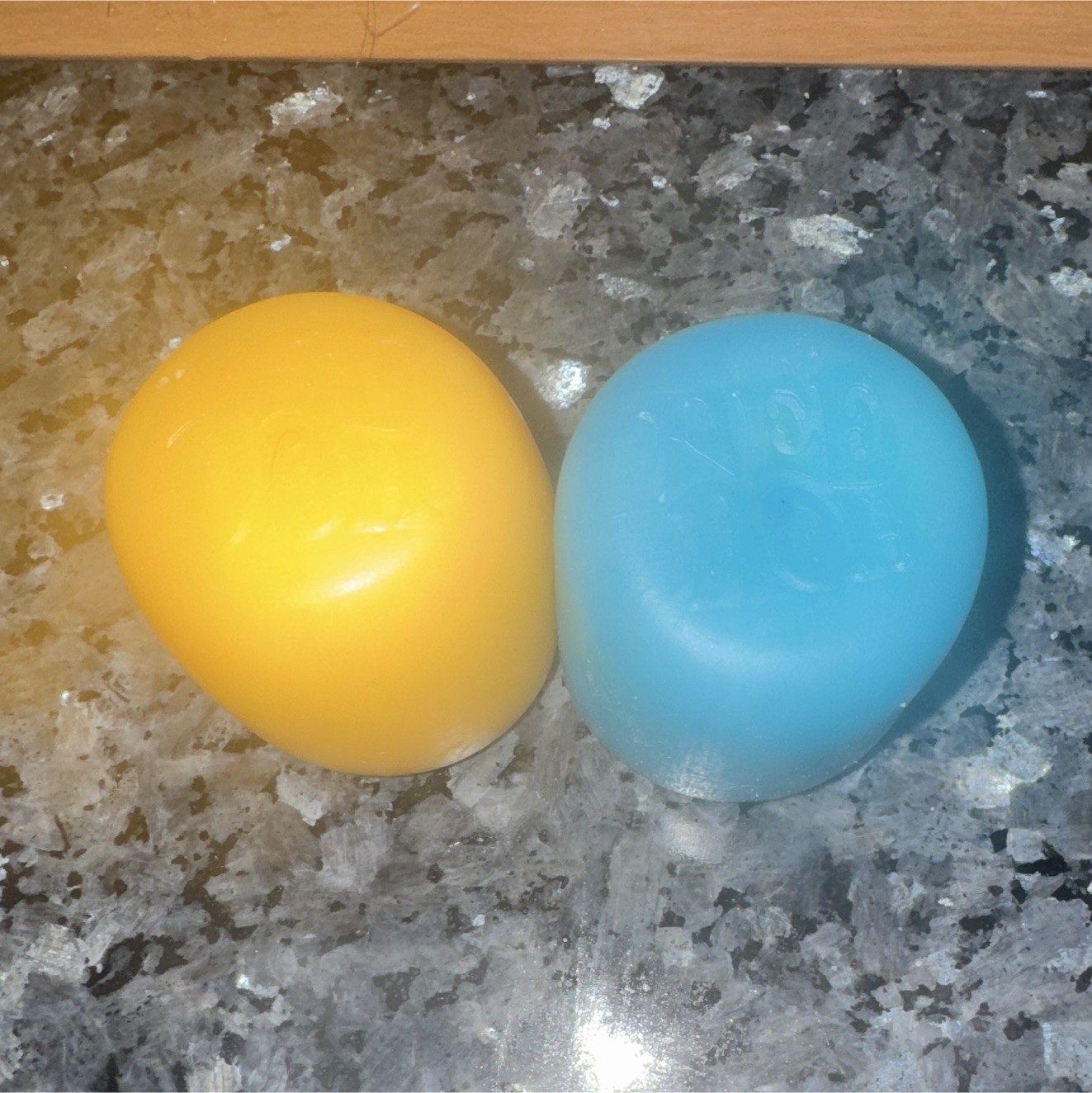 Set of 2 Light Up Squeeze Ball Stress Reliever Toys Blue Yellow 2in Plastic