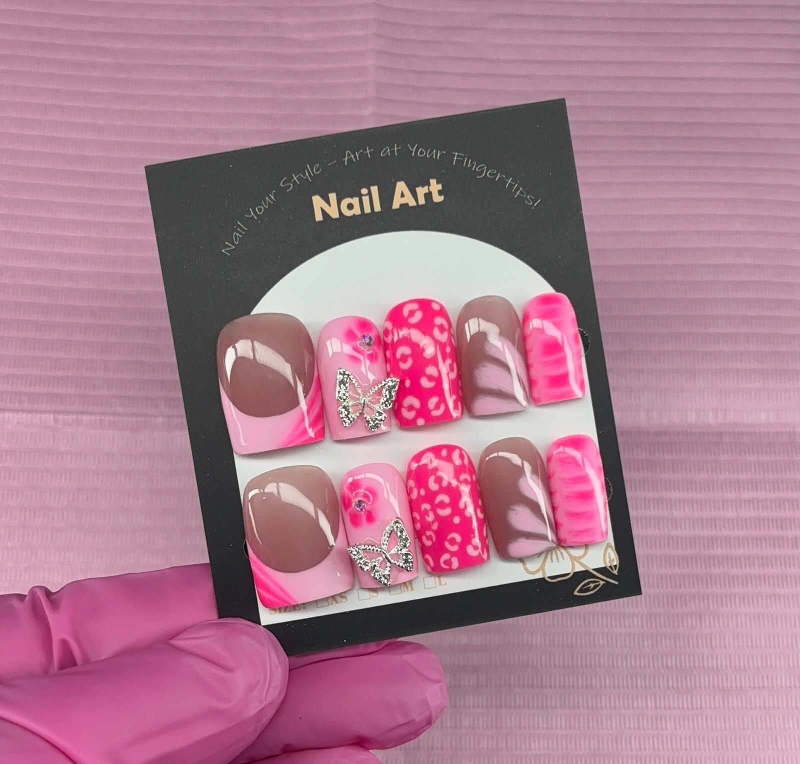 Short square press on nails light pink French tips hot pink butterfly charms