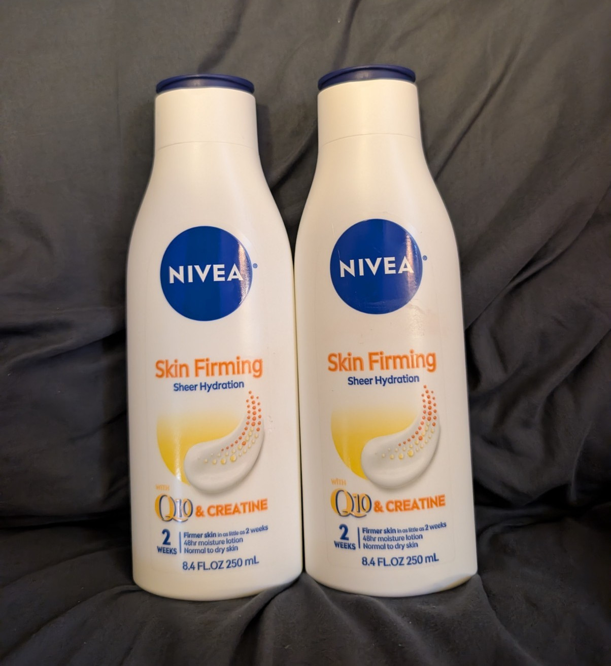 NIVEA Skin Firming Sheer Hydration Body Lotion Q10 + Creatine 8.4 fl oz 2pk
