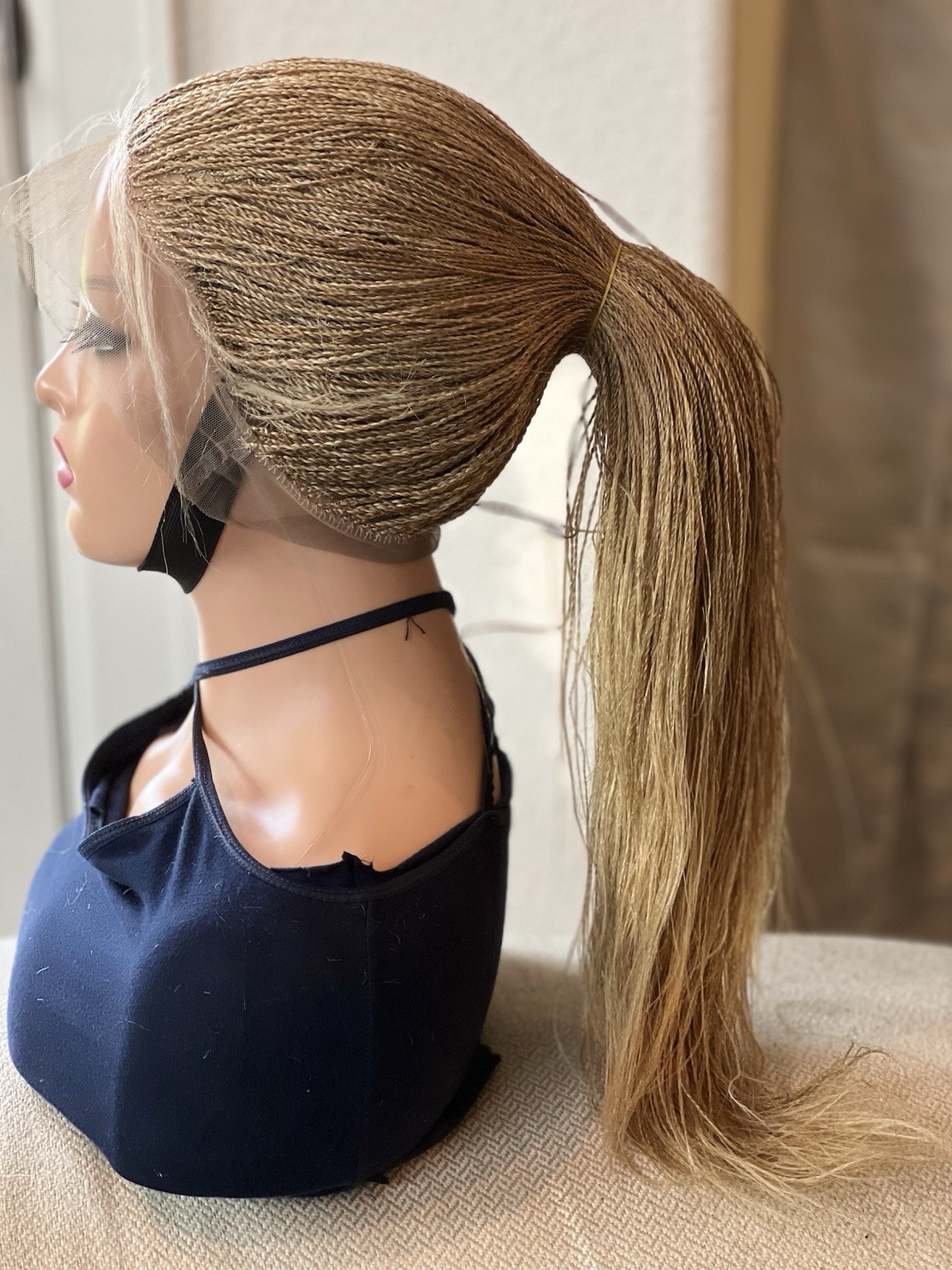 BRAIDED MICRO TWIST WIG . Made on a full lace wig.length is 26 Golden blonde.
