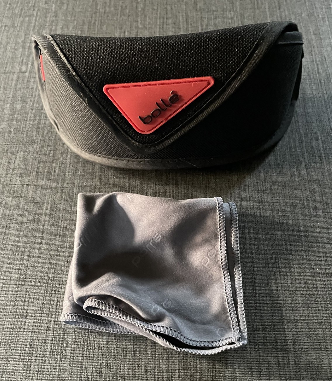 Bolle’ Sunglass Case Black w/ Red Logo. Includes Branded Cleaning Cloth.