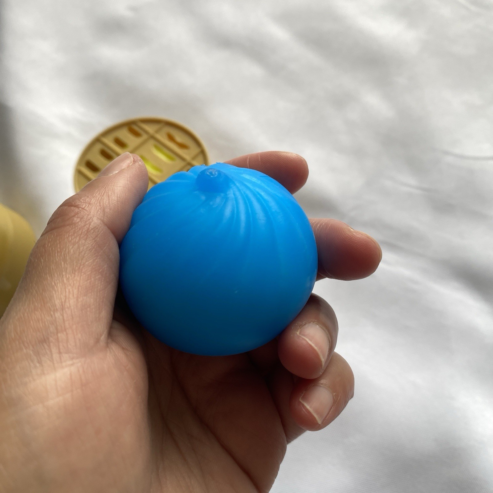 Dumpling Tear-Resistant Squeeze Ball Stress Toy in Steamer Basket