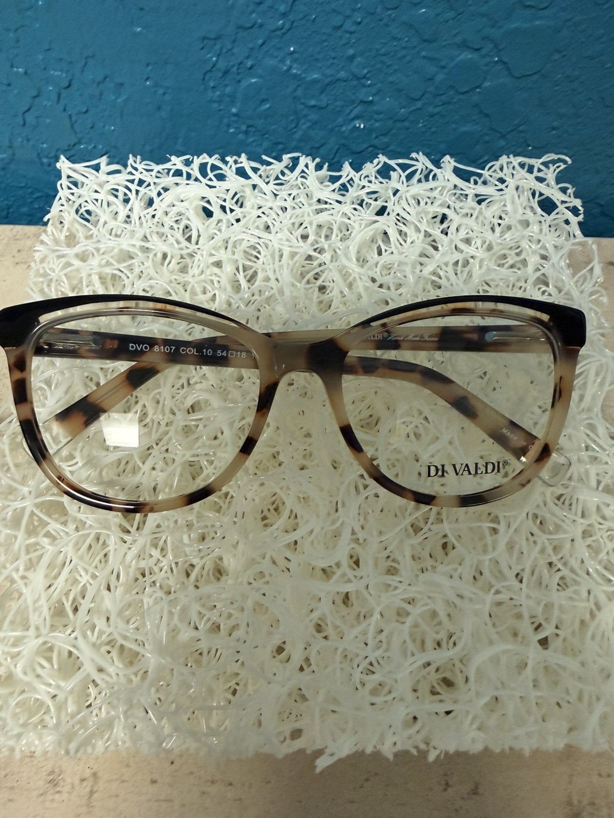 New Di Valdi DVO8107 color 10 is described as a Creme Tortoise 54-18-140
