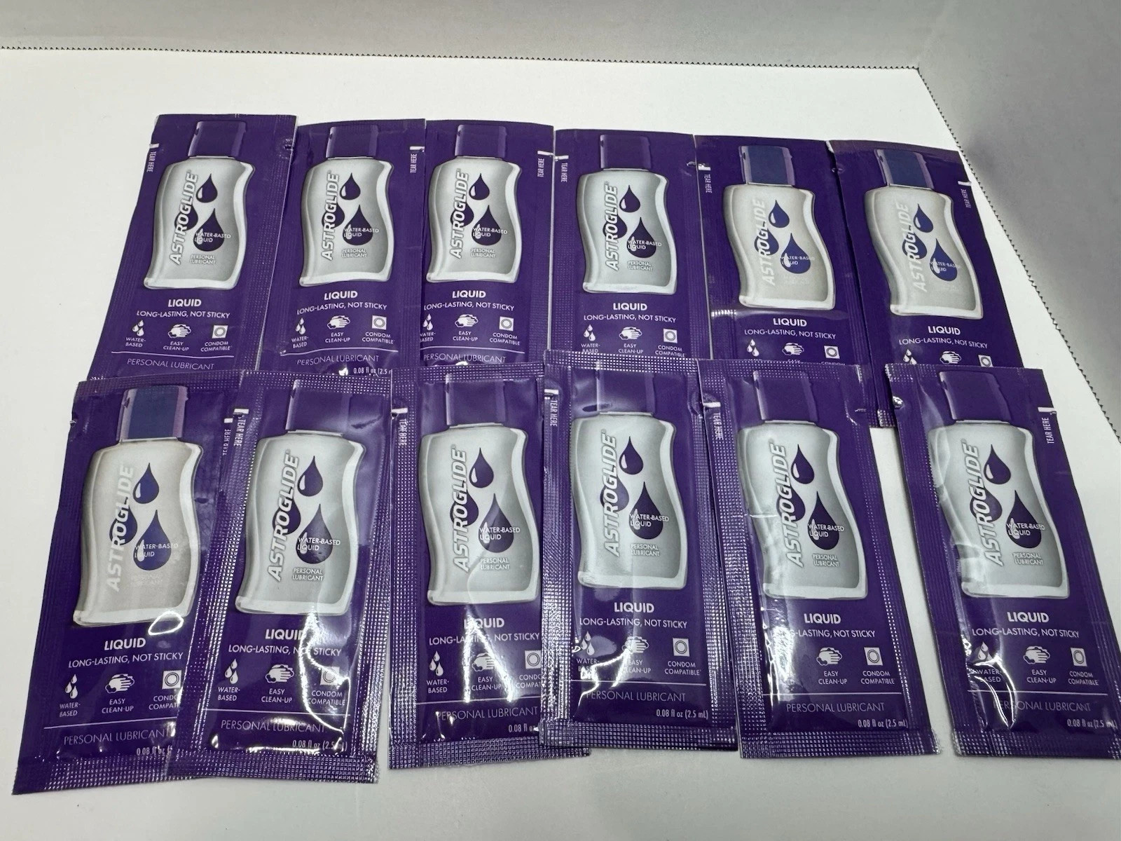Astroglide Liquid Water Based Personal Lubricant Travel Sz Lot X 12 (2/28)