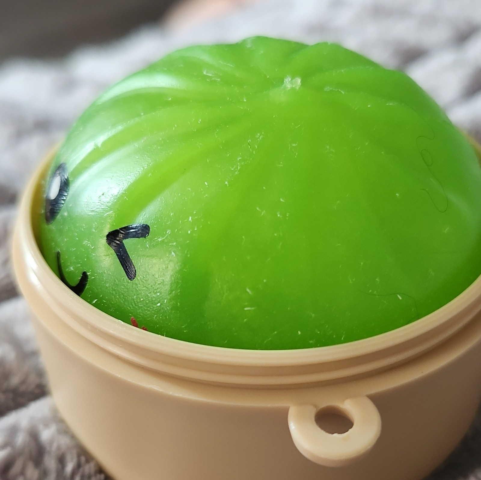 Green Plastic Squishy Squeeze Ball Stress Reliever w/ Beige Case & Loop, 3 in
