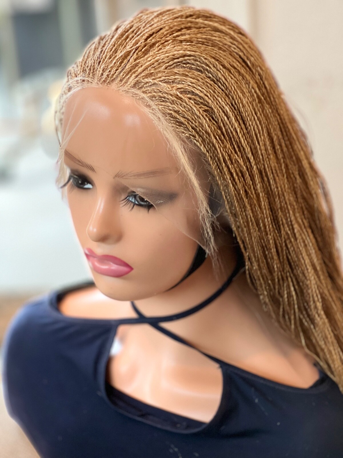BRAIDED MICRO TWIST WIG . Made on a full lace wig.length is 26 Golden blonde.