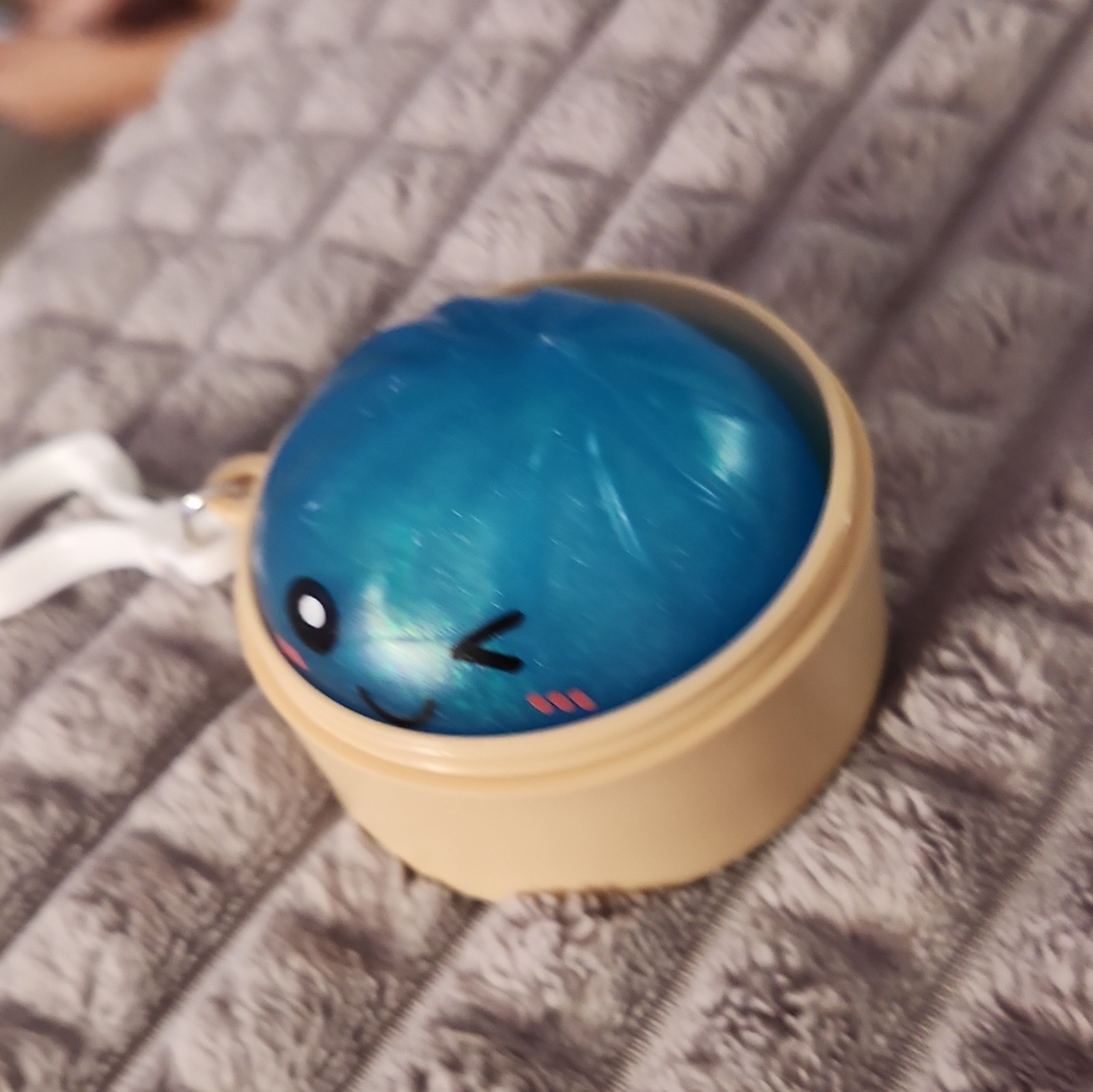 Blue Gel Squeeze Ball Stress Reliever w/ Beige Plastic Case & Keychain, 3 in