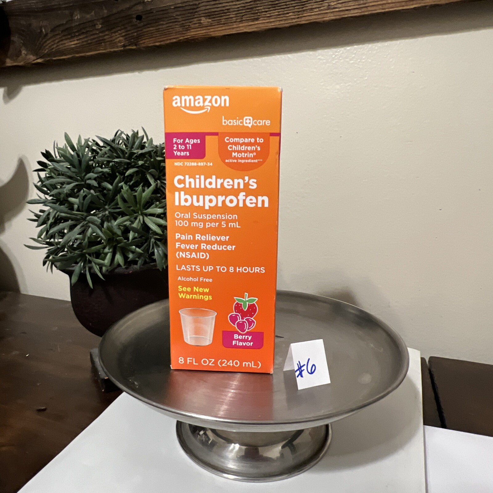 Amazon Basic Care childrens Ibuprofen Oral suspension 100 mg per 5 ml Berry 8oz