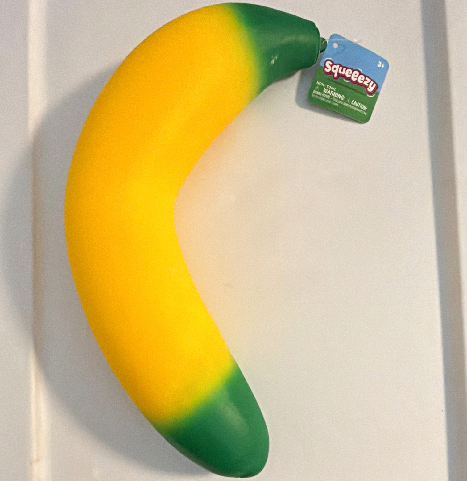 Squeezy Banana Squeeze Toy Stress Reliever, Yellow/Green, 3+