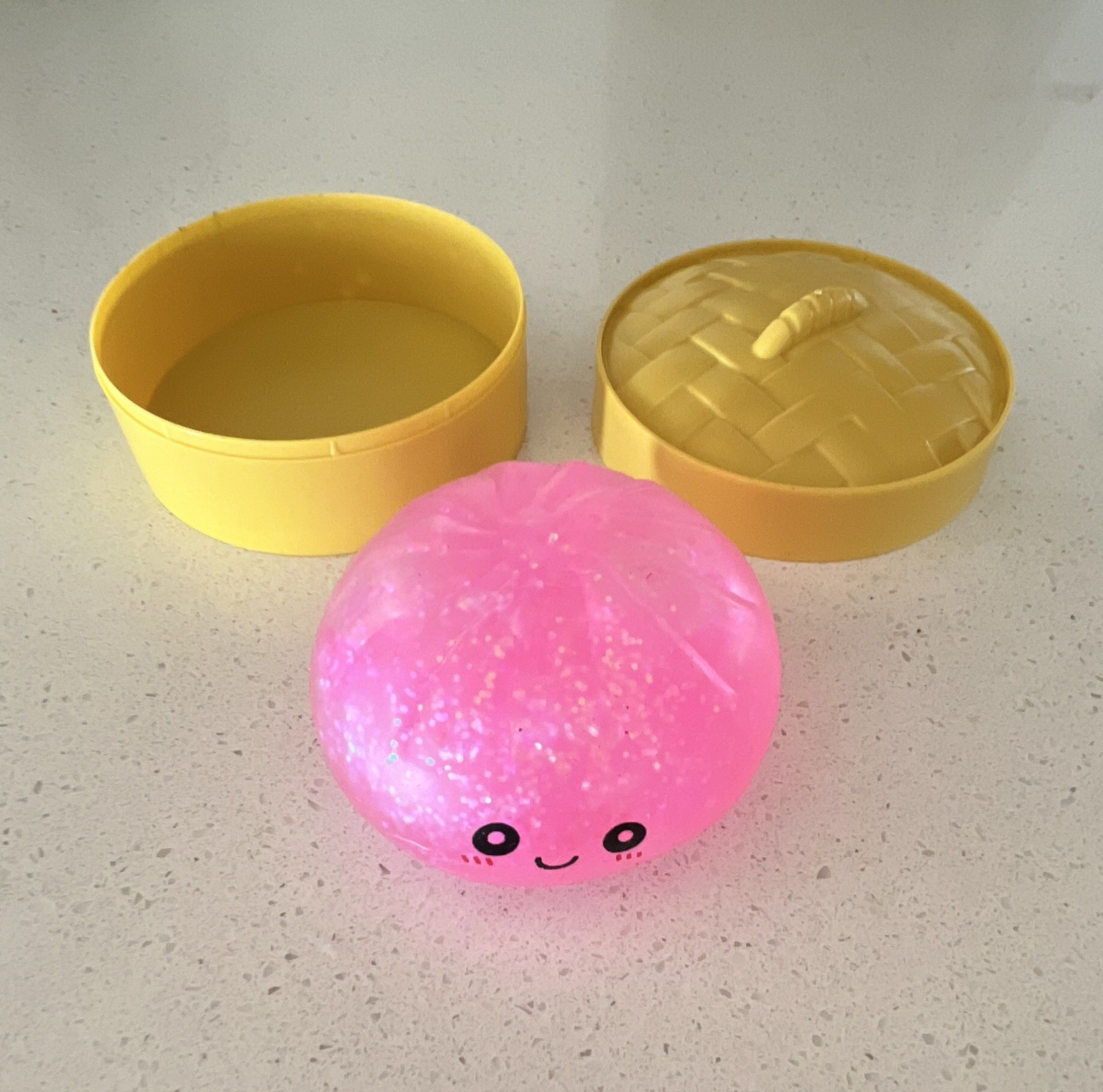 Light-Up Pink Squeeze Ball Stress Reliever Toy w/ Yellow Container, Battery