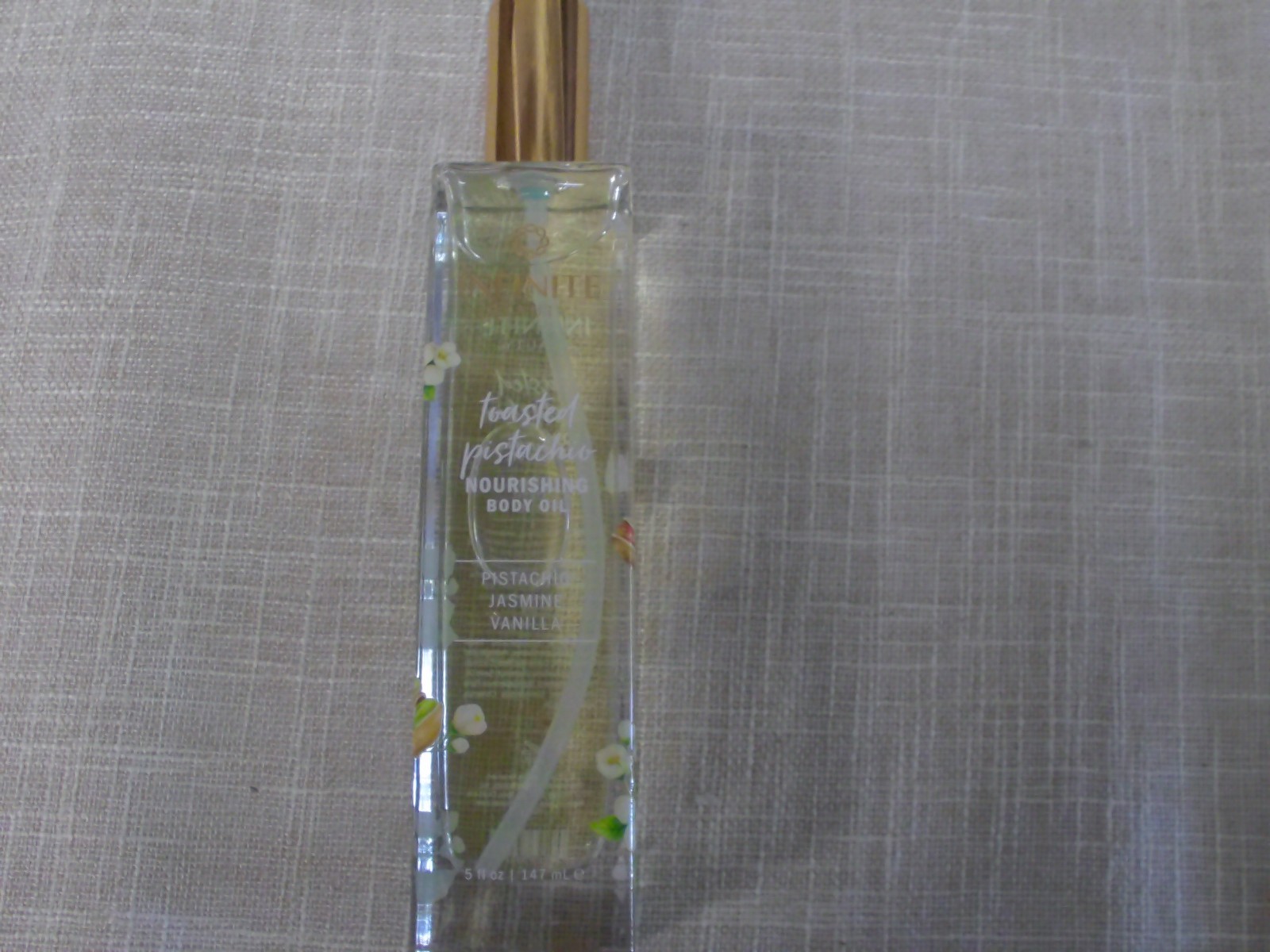 INFINITE Beauty Toasted Pistachio Nourishing Body Oil ~ NWOB ~ PERFUME OIL