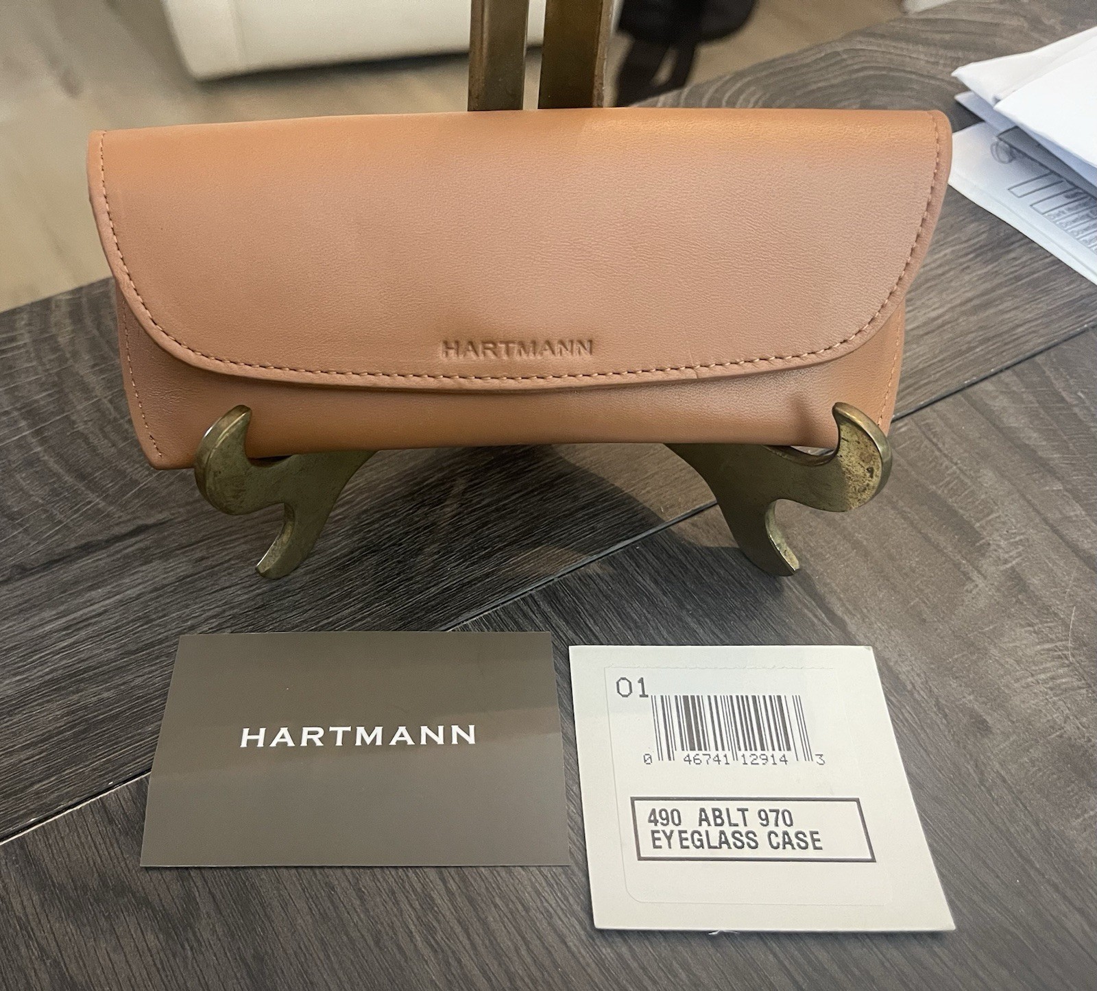 A contemporary Hartmann tan leather eyeglass case