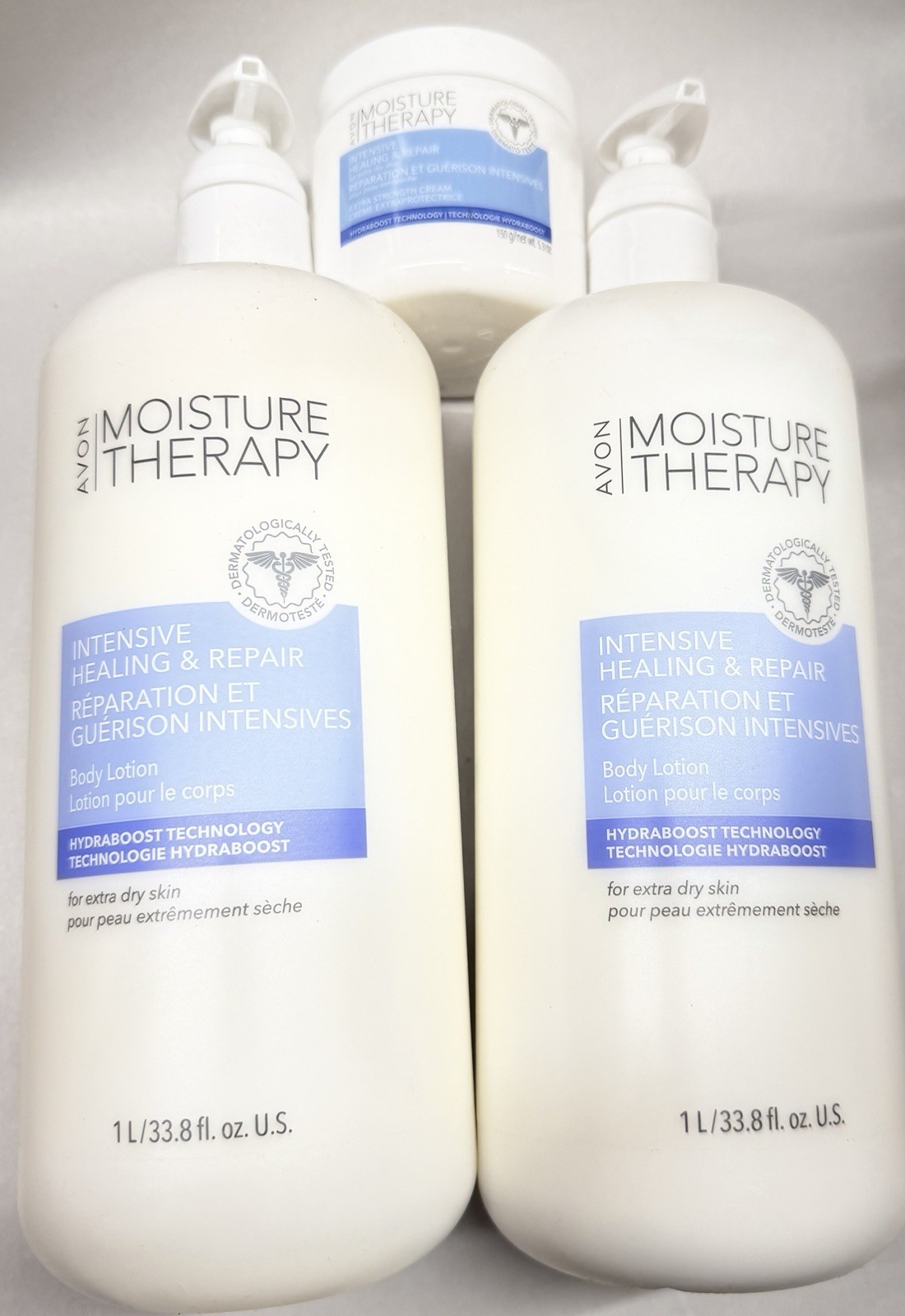 AVON MOISTURE THERAPY INTENSIVE HEALING/ REPAIR 2 BODY LOTION, free 5oz cream
